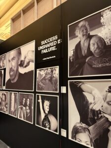 A wall of photos at Paul Mitchell System's Desert Bloom conference