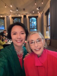 Color expert Leatrice Eiseman poses with a guest at the Association of Image Consultants International conference in Chicago, 2026