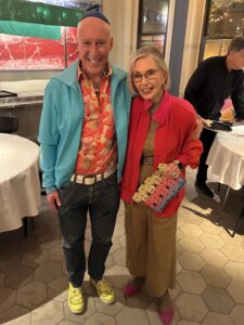 Color expert Leatrice Eiseman stands next to clothier and color analyst, Edwards Buice, both wearing bright colors